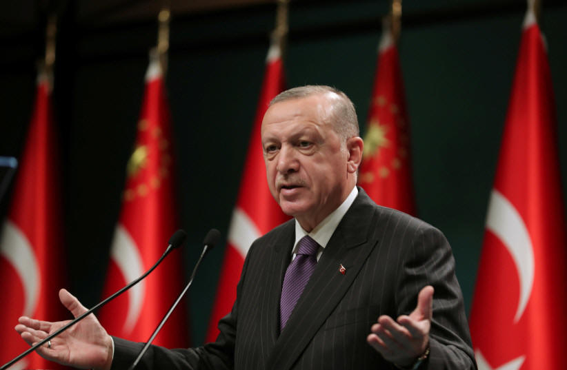 Turkish President Tayyip Erdogan speaks during a news conference following a cabinet meeting in Ankara, Turkey, December 14, 2020 (photo credit: PRESIDENTIAL PRESS OFFICE/HANDOUT VIA REUTERS)