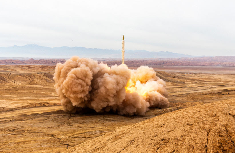  A missile is launched during a joint exercise called the 'Great Prophet 17', in the southwest of Iran, December 24, 2021. Picture taken December 24, 2021.  (photo credit: SAEED SAJJADI/FARS NEWS/WANA (WEST ASIA NEWS AGENCY)VIA REUTERS)