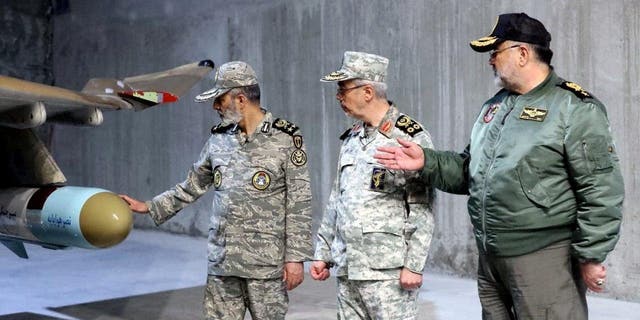 Iran's Army chief, Major General Abdolrahim Mousavi, and Iranian Armed Forces Chief of Staff Major General Mohammad Bagheri visit the first underground air force base, called "Eagle 44," at an undisclosed location in Iran.&nbsp;