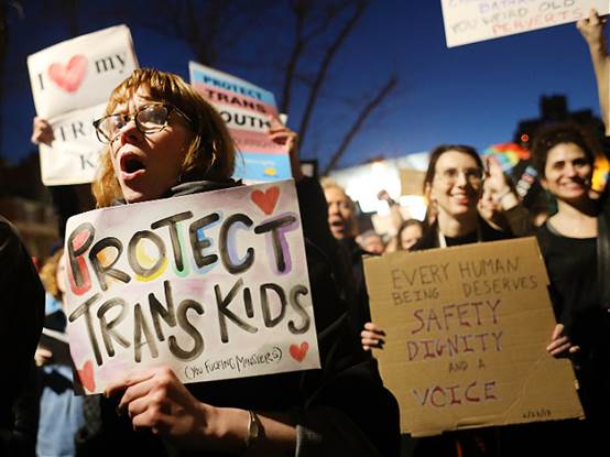 NEW YORK, NY - FEBRUARY 23: Hundreds protest a Trump administration announcement this week that rescinds an Obama-era order allowing transgender students to use school bathrooms matching their gender identities, at the Stonewall Inn on February 23, 2017 in New York City. Activists and members of the transgender community gathered outside the historic LGTB bar to denounce the new policy. (Photo by Spencer Platt/Getty Images)