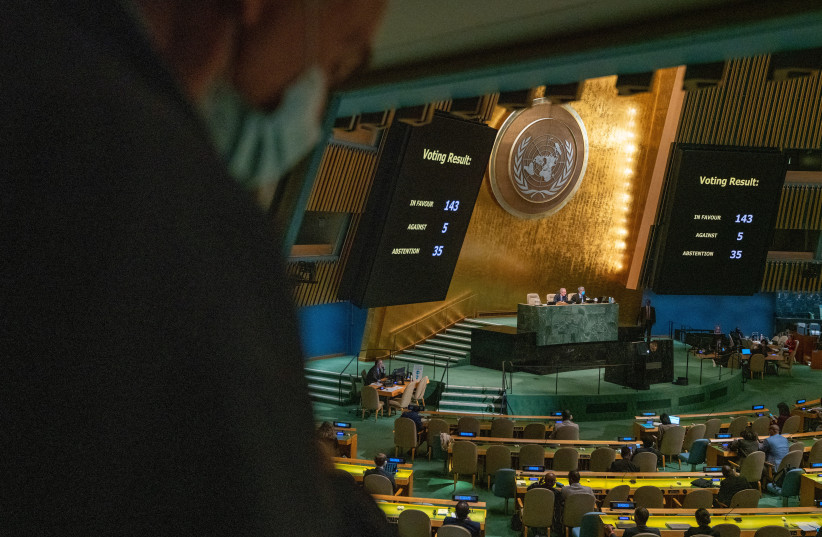  Monitors at the United Nations General Assembly hall display the results of a vote on a resolution condemning the annexation of parts of Ukraine by Russia, amid Russia's invasion of Ukraine, at the United Nations Headquarters in New York City, October 12, 2022 (credit: REUTERS/DAVID 'DEE' DELGADO)