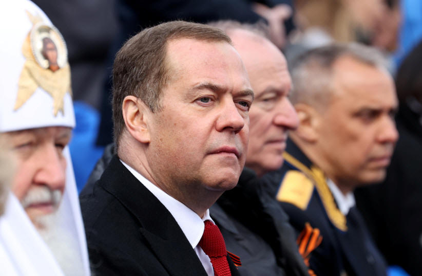  Deputy Chairman of Russia's Security Council Dmitry Medvedev attends a military parade on Victory Day, which marks the 77th anniversary of the victory over Nazi Germany in World War Two, in Red Square in central Moscow, Russia May 9, 2022. (photo credit: SPUTNIK/EKATERINA SHTUKINA/POOL VIA REUTERS)