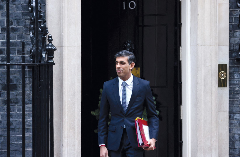  British Prime Minister Rishi Sunak exiting 10 Downing Street on December 14, 2022.  (credit: HENRY NICHOLLS/REUTERS)